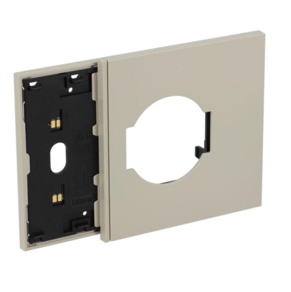 Electrified frame with Italian and German standard socket escutcheon for 3-module box. Sand.