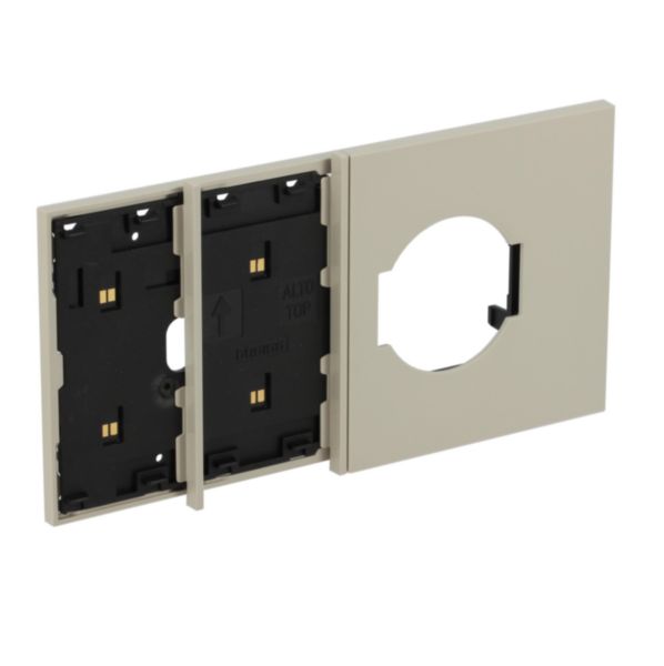 Electrified frame with Italian and German standard socket escutcheon for 4-module box. Sand.